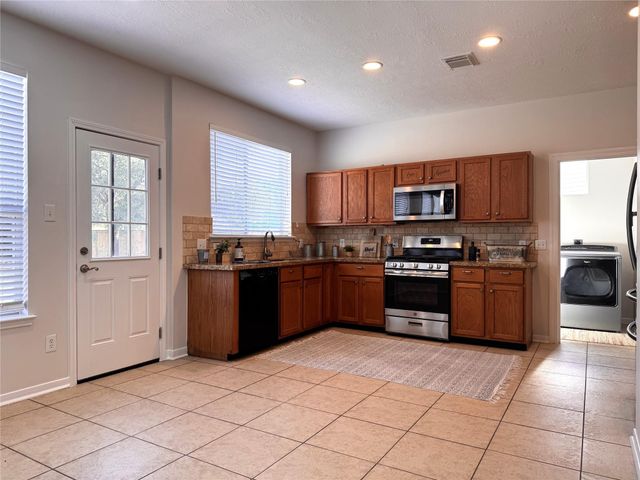 23906 Kingmont Knoll Court, Spring, TX 77373