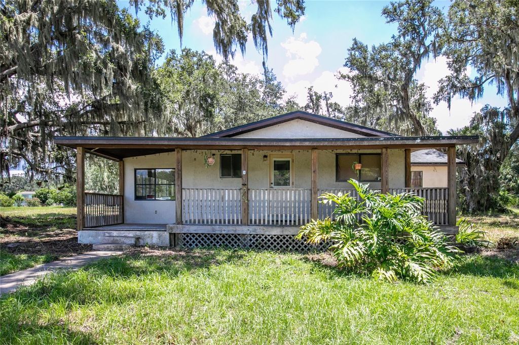 Image 1 of property listing at 35216 N TREASURE ISLAND AVENUE, Leesburg, FL 34788