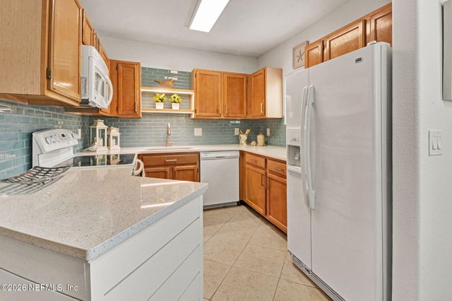 1800 THE GREENS Way 107, Jacksonville Beach, FL 32250