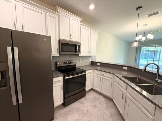 1062 BLACKWOLF RUN ROAD, Davenport, FL 33896