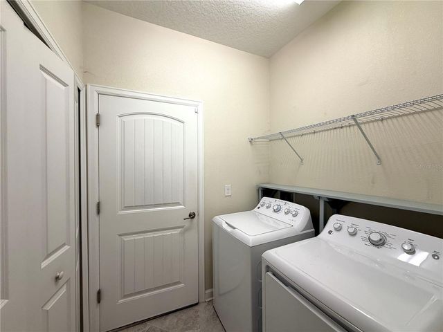 1062 BLACKWOLF RUN ROAD, Davenport, FL 33896