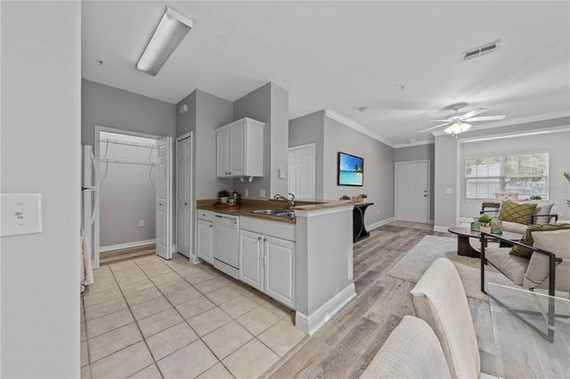130 SOUTHERN PECAN CIRCLE 103, Winter Garden, FL 34787