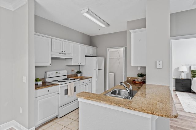 130 SOUTHERN PECAN CIRCLE 103, Winter Garden, FL 34787