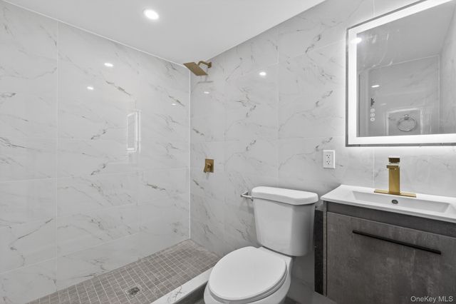 9911 205th Place, Hollis, NY 11423