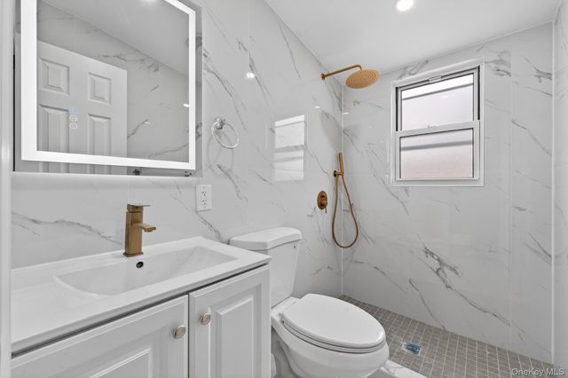 9911 205th Place, Hollis, NY 11423