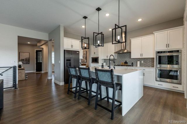 8677 Big Thompson Street, Littleton, CO 80125