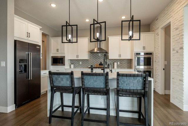 8677 Big Thompson Street, Littleton, CO 80125