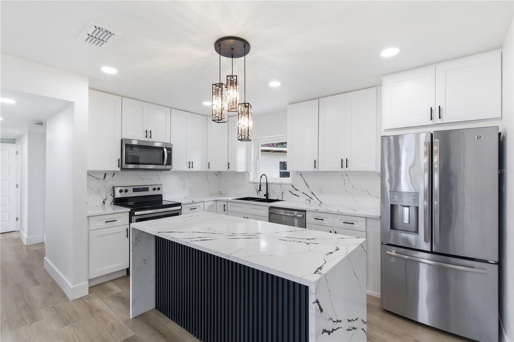 Image 3 of property listing at 907 LEISURE AVENUE, Tampa, FL 33613