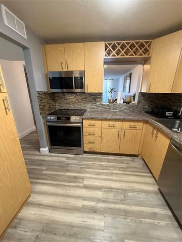 6190 Woodlands Boulevard 107, Tamarac, FL 33319