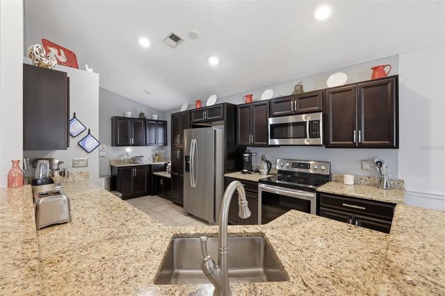 12007 HUNTERS LAKE DRIVE, New Port Richey, FL 34654