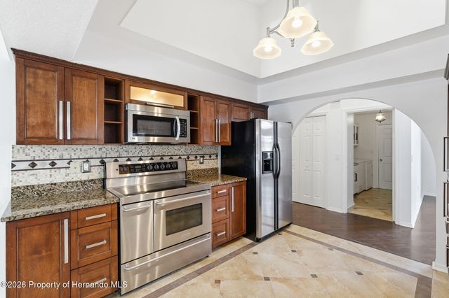 11290 Orangewood Court, Spring Hill, FL 34609