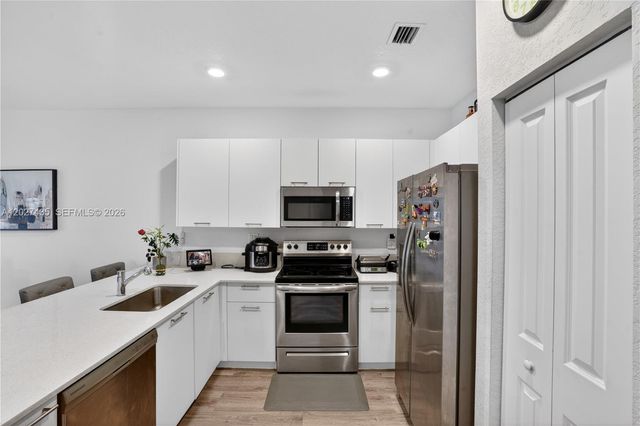 12862 NW 23rd Place, Miami, FL 33167