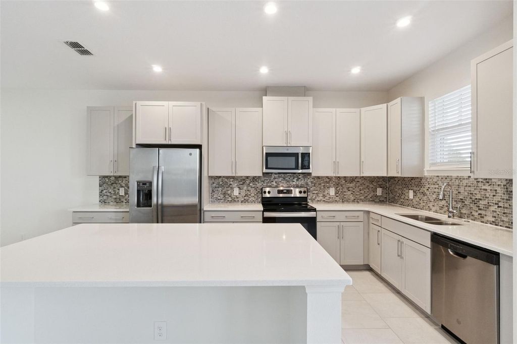 Image 4 of property listing at 14235 KELLOGG AVENUE, Orlando, FL 32827