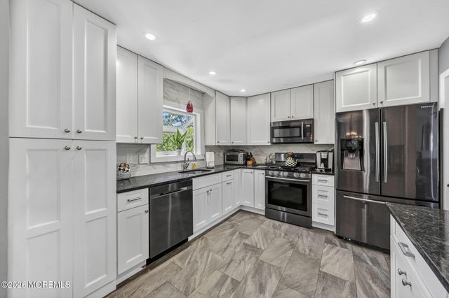 24 Eliot Road, Manalapan, NJ 07726