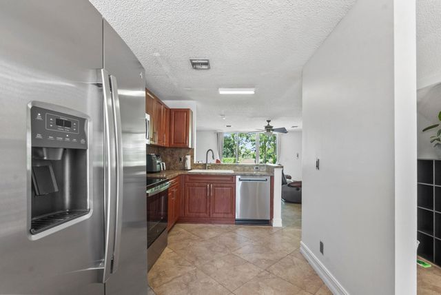 7127 WOODMONT Way 7127, Tamarac, FL 33321