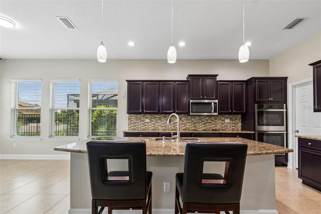 4930 BUTLER NATIONAL DRIVE, Wesley Chapel, FL 33543