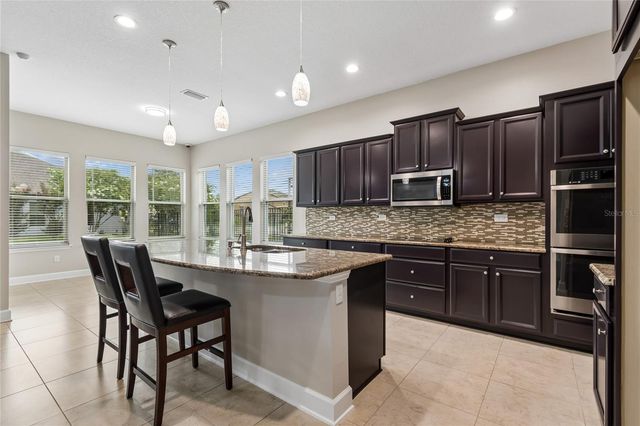 4930 BUTLER NATIONAL DRIVE, Wesley Chapel, FL 33543