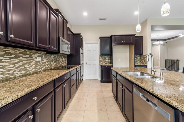 4930 BUTLER NATIONAL DRIVE, Wesley Chapel, FL 33543
