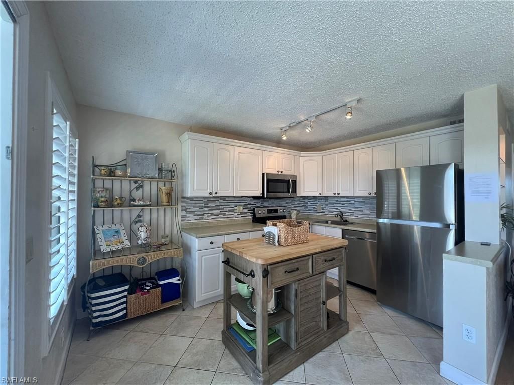 1250 Tennisplace CT A33, SANIBEL, FL 33957 — photo 5
