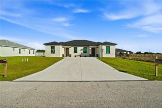 2404/2406 Mae AVE S, Lehigh Acres, FL 33973