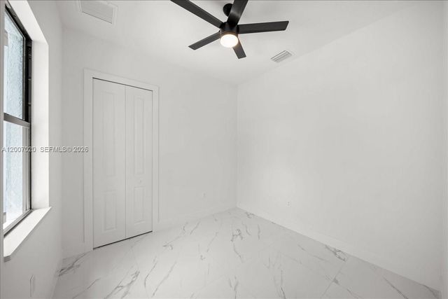 1033 E Plymouth St E, Lehigh Acres, FL 33974