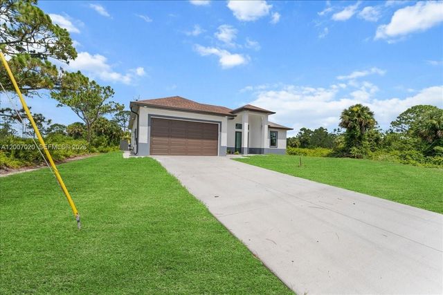 1033 E Plymouth St E, Lehigh Acres, FL 33974