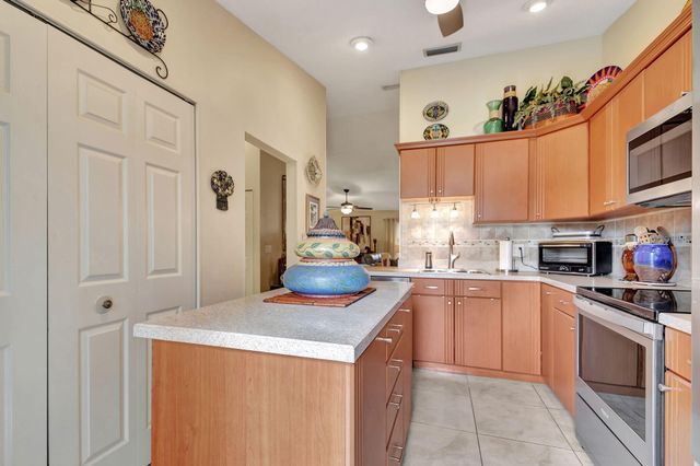 494 Iron Forge Court, Royal Palm Beach, FL 33411