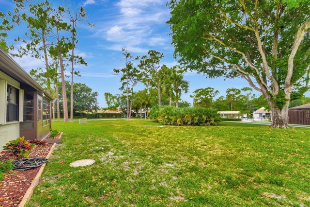 494 Iron Forge Court, Royal Palm Beach, FL 33411