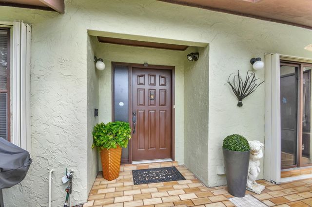494 Iron Forge Court, Royal Palm Beach, FL 33411