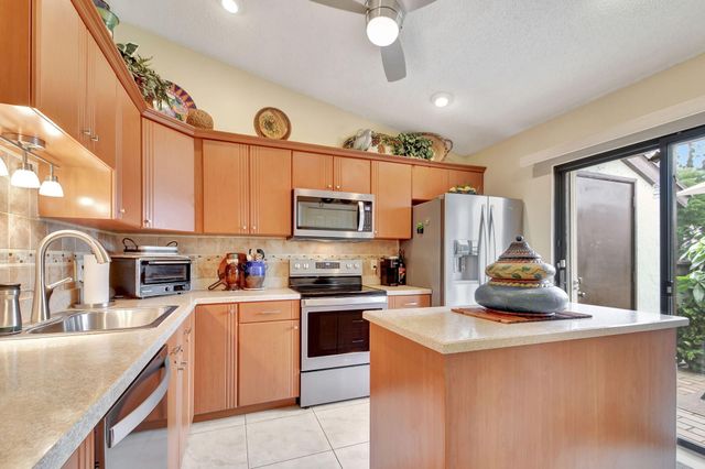 494 Iron Forge Court, Royal Palm Beach, FL 33411