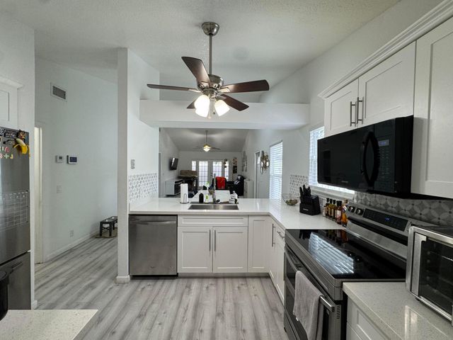 1518 Royal Forest Court, Palm Springs, FL 33406