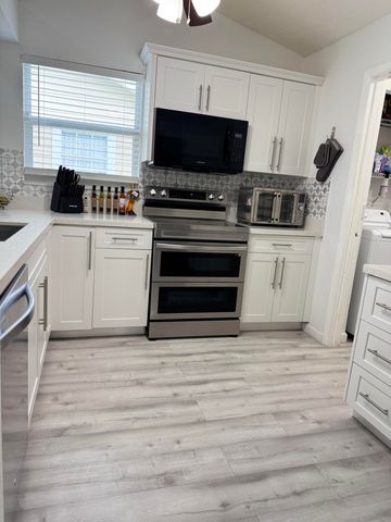 1518 Royal Forest Court, Palm Springs, FL 33406