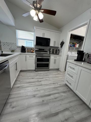 1518 Royal Forest Court, Palm Springs, FL 33406