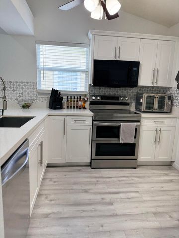 1518 Royal Forest Court, Palm Springs, FL 33406