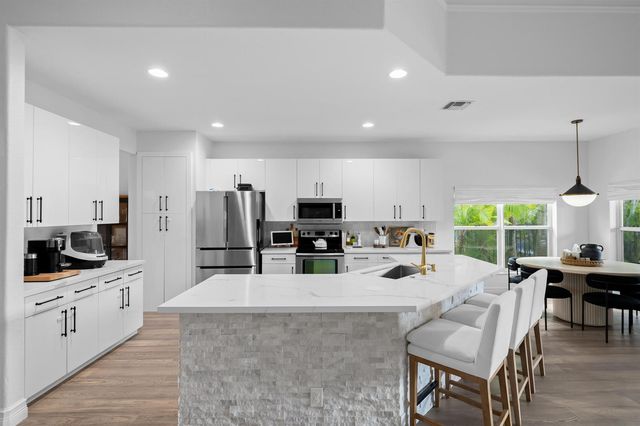 11184 NW 65th Court, Parkland, FL 33076