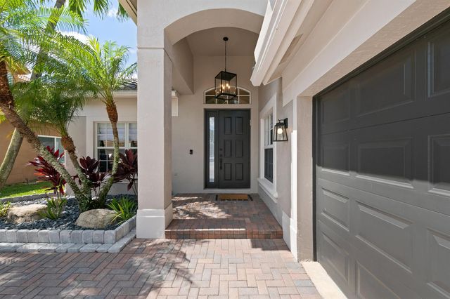 11184 NW 65th Court, Parkland, FL 33076