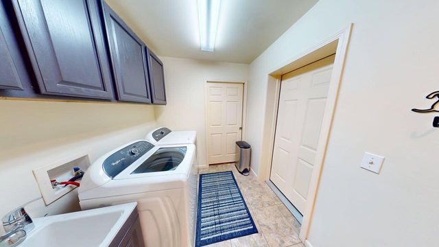 10869 W Higgins Lake Drive, Roscommon, MI 48653