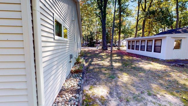 10869 W Higgins Lake Drive, Roscommon, MI 48653