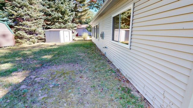 10869 W Higgins Lake Drive, Roscommon, MI 48653