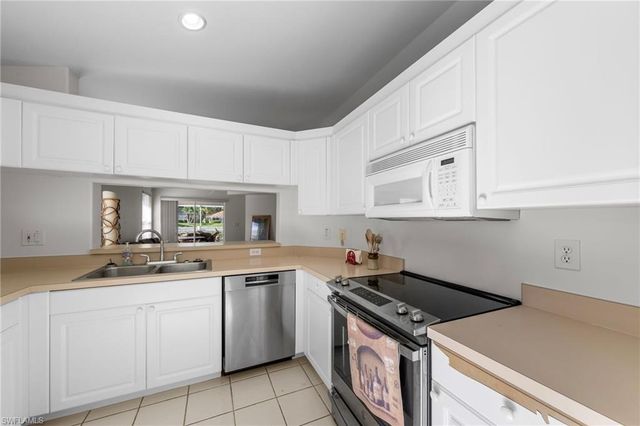 14932 Sterling Oaks DR, Naples, FL 34110