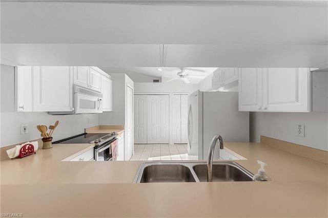 14932 Sterling Oaks DR, Naples, FL 34110