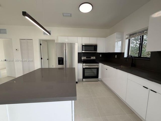 1440 NW 61st St 1, Miami, FL 33142