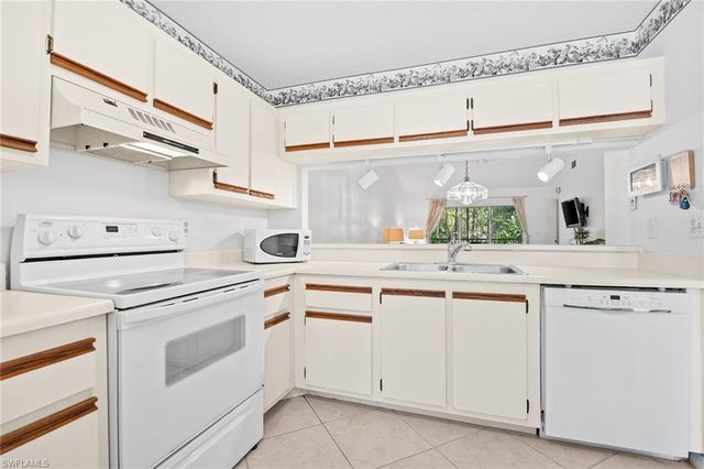 3581 County Barn RD 203, Naples, FL 34112