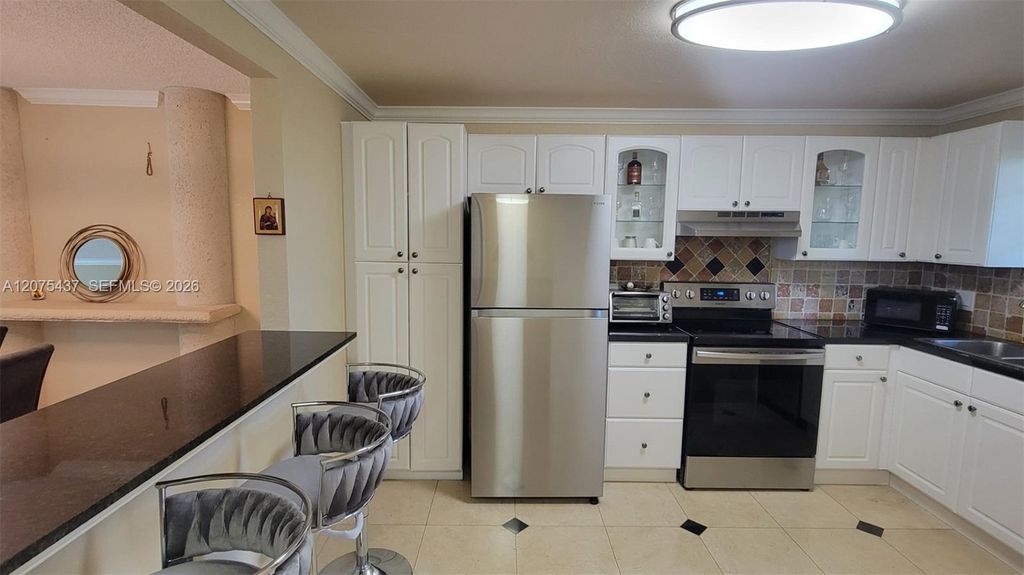 2410 Deer Creek Country Club Boulevard 310E, Deerfield Beach, FL 33442