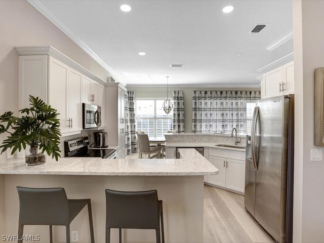 1051 Egrets Walk CIR 7-201, Naples, FL 34108