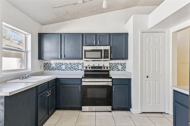 1009 WINDING WATER WAY, Clermont, FL 34714