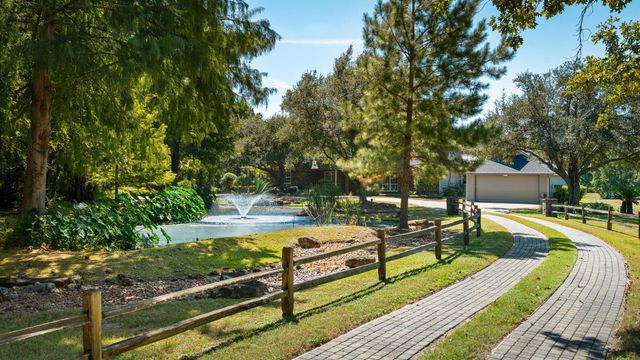 9902 Crestwater Circle, Magnolia, TX 77354