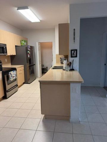 3569 S FOREST HILL Boulevard 106, Palm Springs, FL 33406