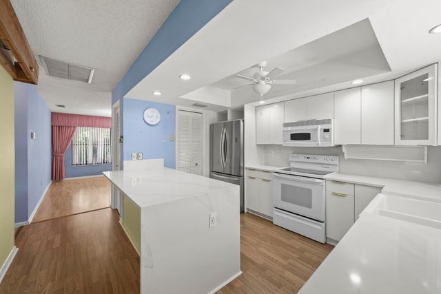 12378 Sawgrass Court, Wellington, FL 33414
