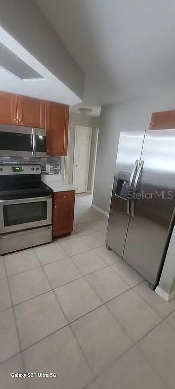 Image 3 of property listing at 9901 WOODSTOCK LANE, Port Richey, FL 34668